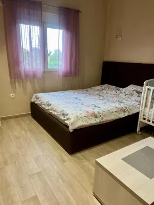 a bedroom with a bed and a window at Casa di Lipa in Bar