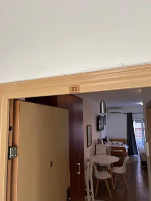 a room with a table and a dining room at Quiet Studio Bečići Garage available 5 e per day in Boreti