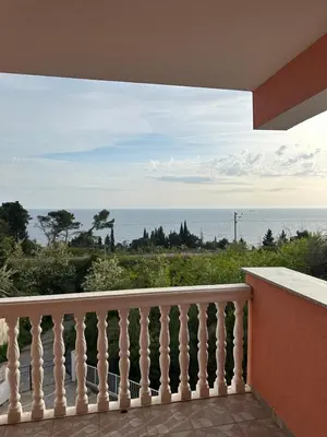 a balcony with a view of the ocean at Benelux Šušanj in Bar