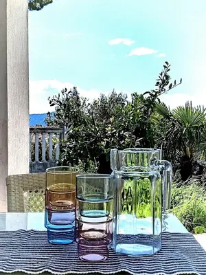 two glasses of water sitting on top of a table at AdelFa 2025- Welcome to Rest in Bar
