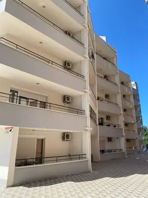 an external view of a building with balconies at Blue Horizon Apartment in Becici in Budva