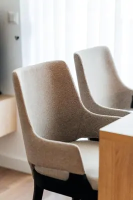 a pair of chairs sitting next to a desk at Twin Towers By In Property in Becici