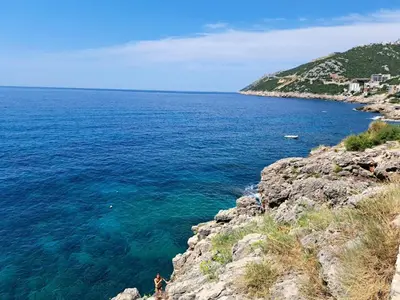 a view of the ocean from a cliff at Swiss DELUXE Appartement in Dobra Voda