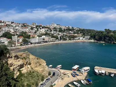 a view of a beach with boats in the water at LuxuryHomeUlcinj2 in Ulcinj