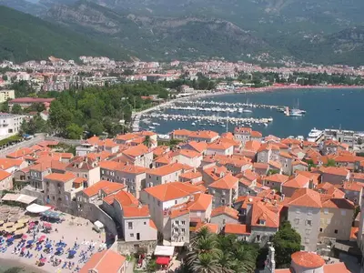 an aerial view of a town with boats in the water at Felicia Apartments in Budva