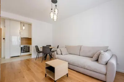 a living room with a couch and a table at Apartments BB in Becici