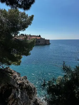 a view of the ocean from a cliff at Mind Wellness Montenegro in Sveti Stefan