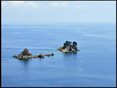 two islands in the middle of the water at Villa VIktoria in Petrovac na Moru