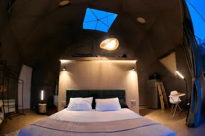 a bedroom in a dome tent with a bed at GO Glamping in Dobra Voda