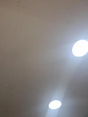 two lights on the ceiling of a room at Start over in Budva