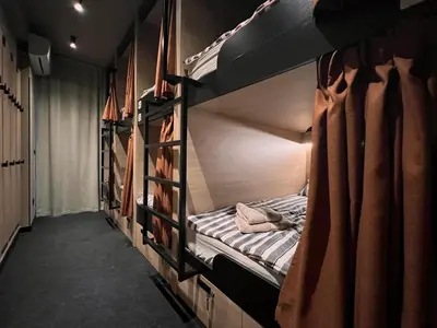 a couple of bunk beds in a room at U-NIGHT Hostel Budva in Budva