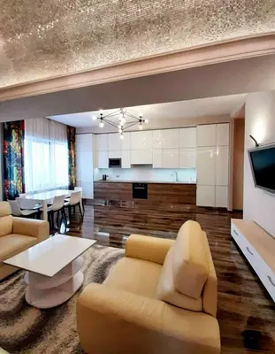a living room with a couch and a table at Apartments Jimasly in Budva