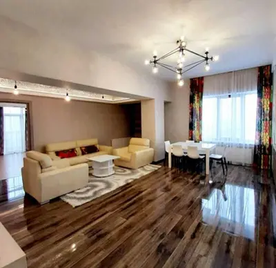 a living room with a couch and a table at Apartments Jimasly in Budva