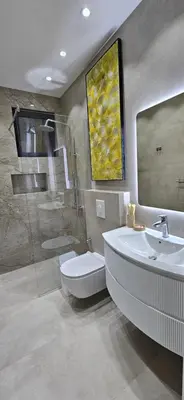 a bathroom with a toilet and a sink and a shower at Bahr DELUX App & Suite in Ulcinj
