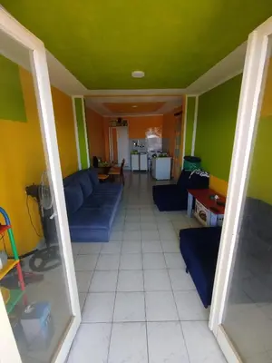 a living room with a couch and a table at Aprtman 2 in Sutomore