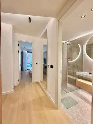 a bathroom with a glass shower in a room at Onia Luxury Escape in Budva