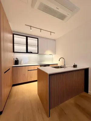 a kitchen with a sink and a counter top at Onia Luxury Escape in Budva