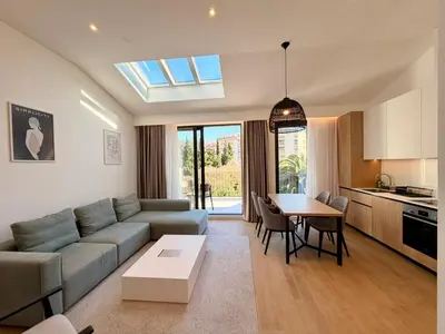 a living room with a couch and a table at Onia Luxury Escape in Budva