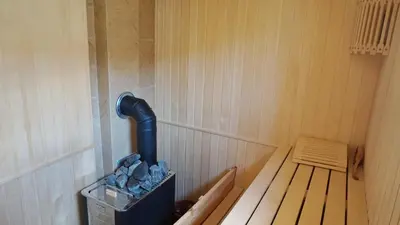 a inside of a sauna with a black piping at Villa Lux Radovici in Radovići