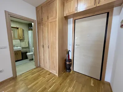 an empty room with a door to a bathroom at Plaza Apartment in Budva