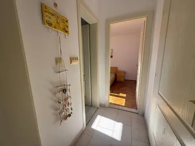 a hallway with a door leading to a room at La Marea in Petrovac na Moru