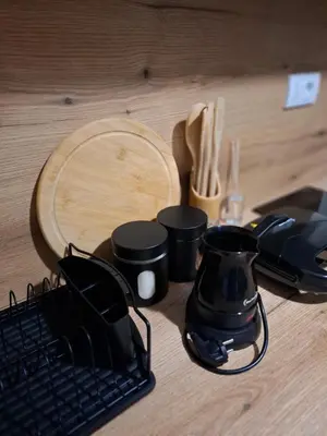 a counter with a blender and a keyboard on a table at Apartments Sophia in Ulcinj