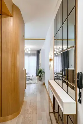 an office hallway with a bench and a mirror at URBAN-Soho City Complex in Bar