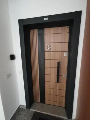 a locker room with a door in a building at Ulcinj Vibes & Waves Apartment in Ulcinj