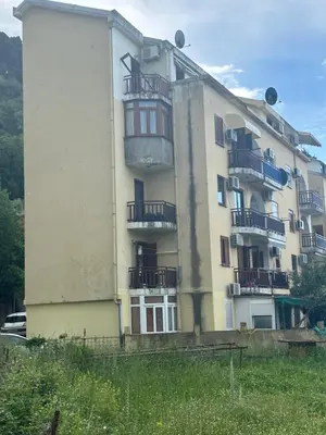 a large building with balconies on the side of it at Apartment Shell in Budva