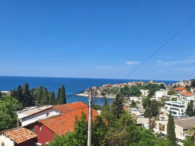 a view of a city and the ocean at Larimar Cozy Apartment in Ulcinj