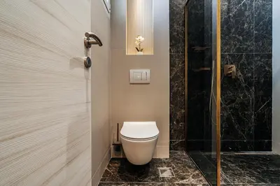 a bathroom with a toilet and a shower at Przno Gate 114 By In Propety in Pržno