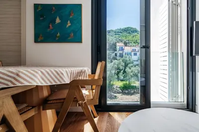 a room with a bed and a large window at Przno Gate 114 By In Propety in Pržno
