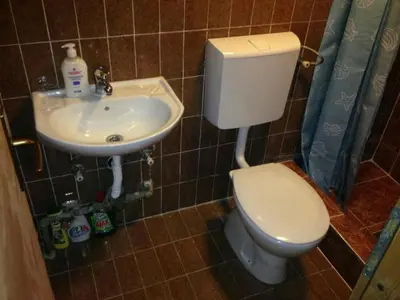 a bathroom with a toilet and a sink at Apartments Old Town in Budva