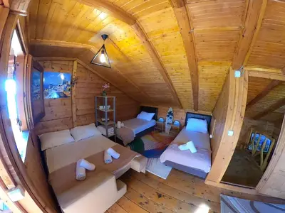 an overhead view of a living room in a log cabin at Ada Dream House in Kravlja