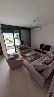 a living room with two couches and a fireplace at Sutomore - Lux apartment 1 in Sutomore