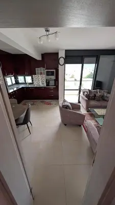 a living room with a couch and a table at Sutomore - Lux apartment 1 in Sutomore