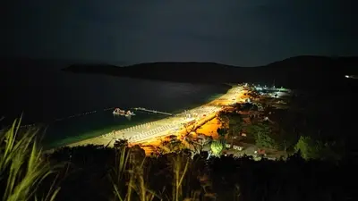 a view of a beach at night at The best sea view in Prijevor