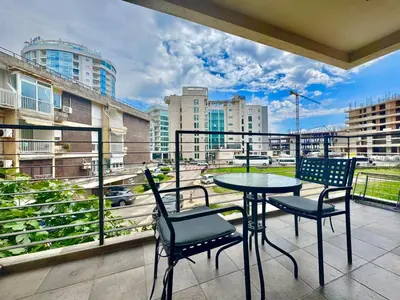 a patio with a table and chairs on a balcony at Two bedroom apartment Andrej in Budva