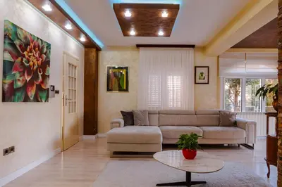 a living room with a couch and a table at Villa Dragana in Budva