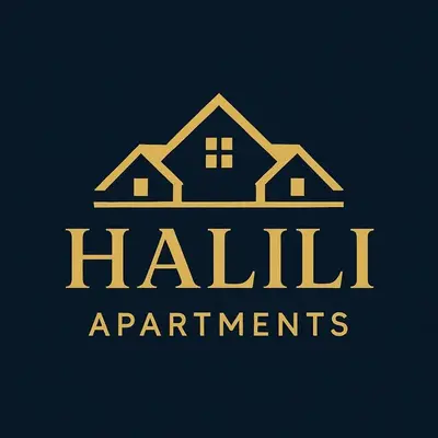 a logo for a real estate company with a house at Halili Apartments in Ulcinj