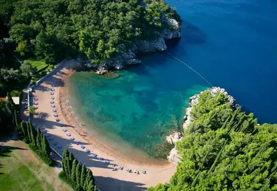 an aerial view of a beach with a group of people at Summer Nest Studio in Becici in Becici