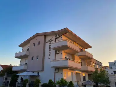 a large building with at MARSHAL Apartments in Donji Štoj