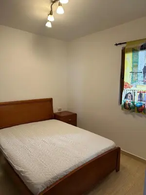 a bedroom with a bed and a window at Tri bora in Bar