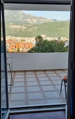 a balcony with a view of a city at Nina Apartment 5 in Budva