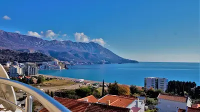 a view of a city and a body of water at Apartment Sea Point in Becici