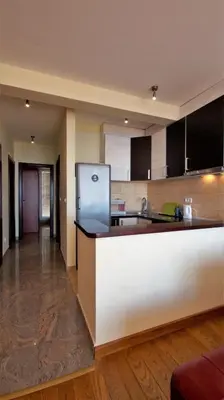 a kitchen with a counter and a refrigerator at Apartment Sea Point in Becici