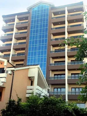 a tall building with a lot of windows at Apartmans Budva centar in Budva