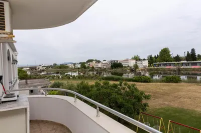 a balcony with a view of a river at Villa Duraku in Ulcinj