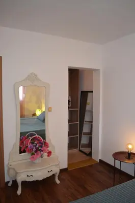 a mirror sitting on a table in a room at Lovely 1BR Apartment 5min of walk from city center in Bar