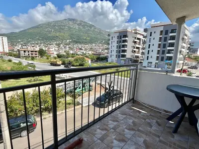 a balcony with a view of a city at B&V apartmani in Bar, Susanj